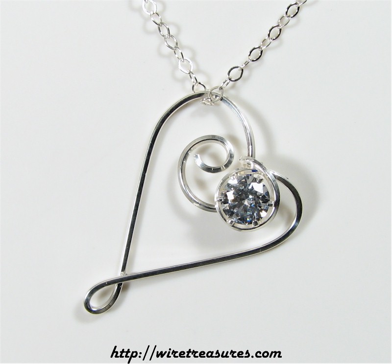 Dancing Heart Pendant with Faceted CZ