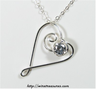 Dancing Heart Pendant with Faceted CZ